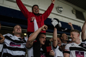 Martin Gray is held aloft by the players