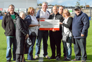 Community notes DFC Lottery Cheque Presentation