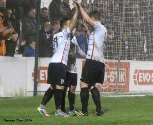 Nathan Cartman is congratulated after scoring the second