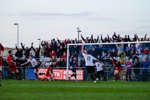 Leon Scott scores