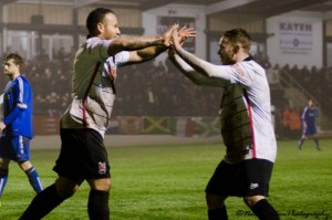 Nathan cartman congratulates Stephen Thompson after scoring the third goal v Skem