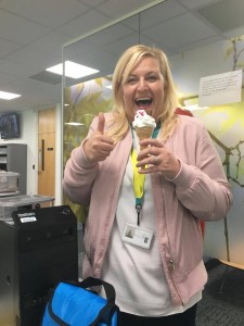 Karen Cowper enjoys her ice cream at work