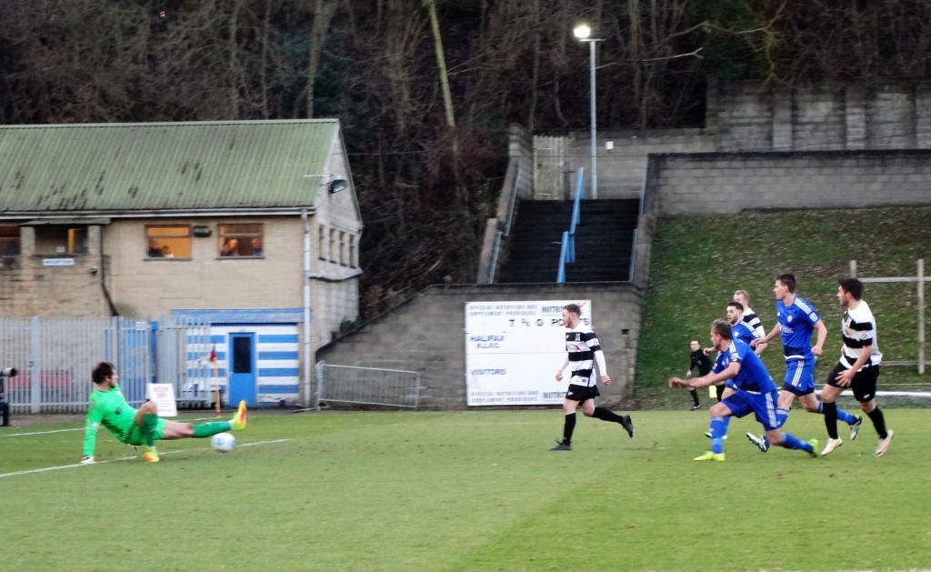 from a different angle, Josh's effort is on its way into the net