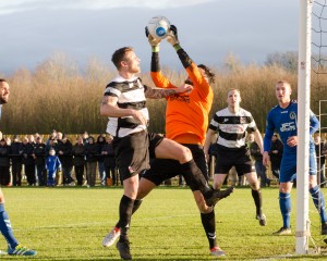 Captain Kev challenging the Curzon shot stopper.