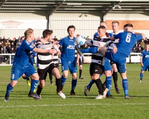 Anyone for keepy-up? Gillies and Thommo battling their way through a crowd of opponents. 