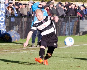 Liam Marrs moving the ball up-field. 