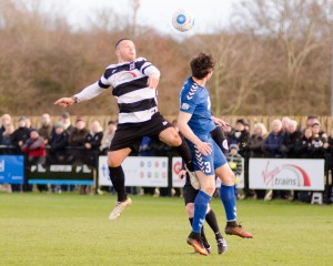 Stephen Thompson out-jumping a defender.