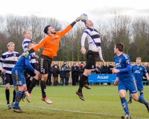 Mark Beck leaps in vain.