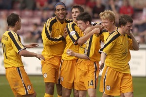 Football - Lincoln City v Darlington - Darlington goal scorer Neil Wainwright (14) is congratulated on his goal by team-mates