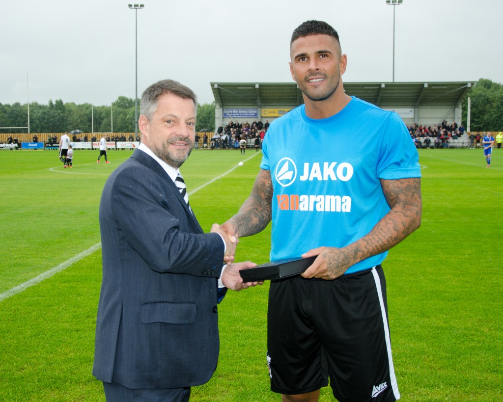 Leon Scott presented with a memento for his 200th appearance