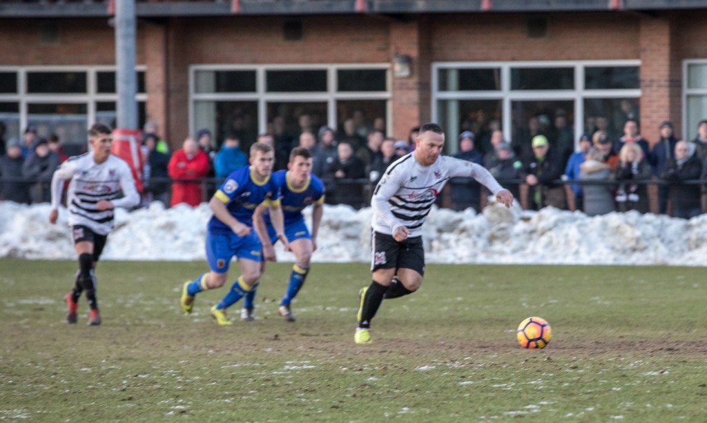 Stephen Thompson with penalty v Chorley