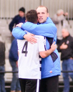 Gary Brown and Phil Turnbull embrace