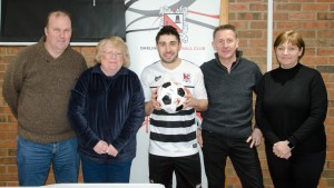 Josh Gillies with matchball sponsors