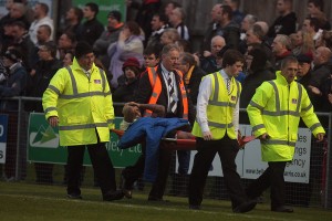 Leon is stretchered off v Ramsbottom