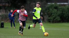 Darlington sign left-sided player Ben Jackson from Huddersfield