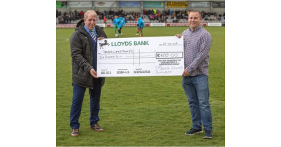 Embrace Church present £600 cheque to DFC