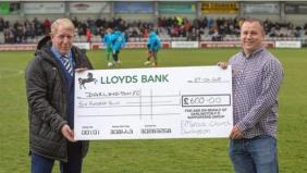Embrace Church present £600 cheque to DFC