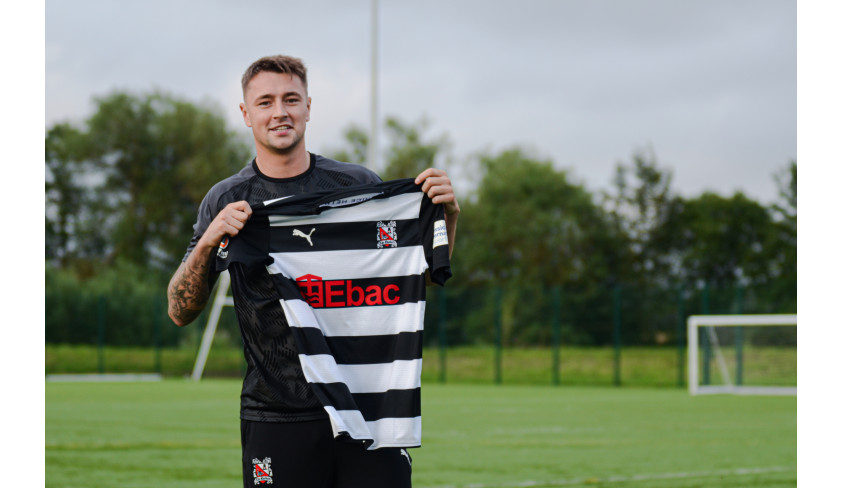 Quakers sign Josh Heaton for the second time