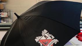 Buy a DFC umbrella for the wintry weather!