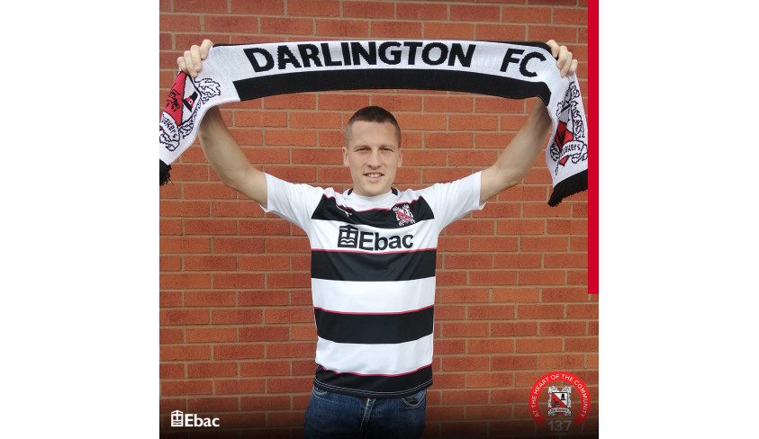 Quakers sign striker Dan Maguire