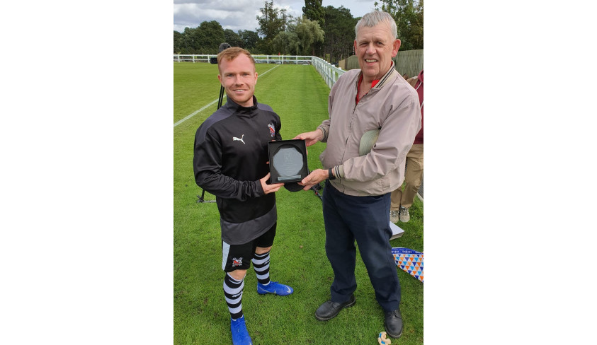 Adam receives leading scorer award