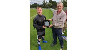 Adam receives leading scorer award