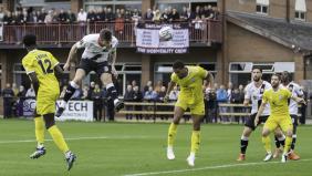 Luke heads the winner for Quakers