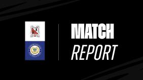 Ten man Quakers hold on for a point