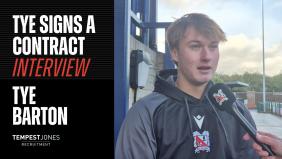 Tye signs a contract