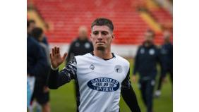 Ethan Fitzhugh signs for Quakers